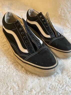 Vans Black and White Low-Top Slip-On Style Sneakers